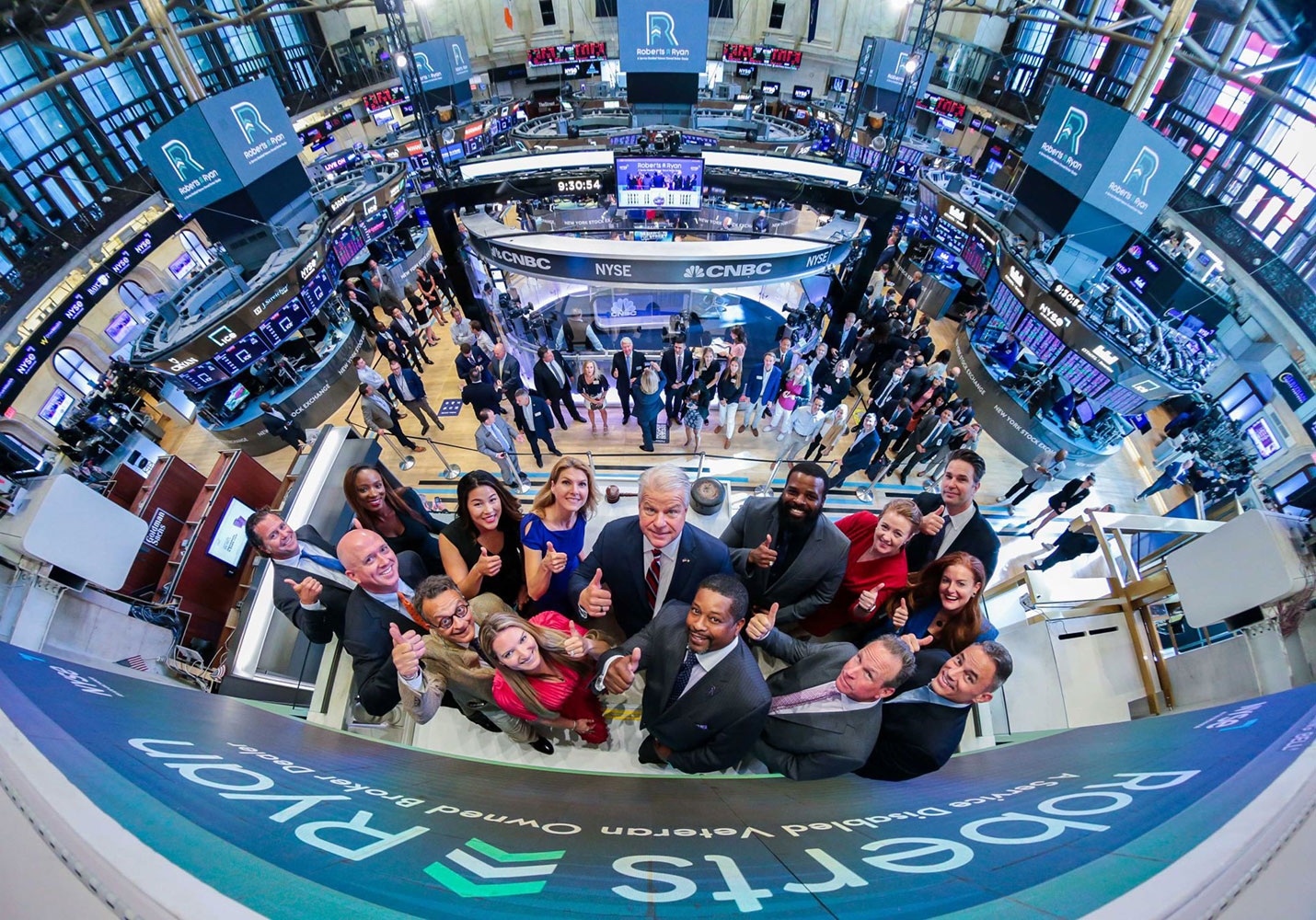 Roberts and Ryan rings the NYSE opening bell