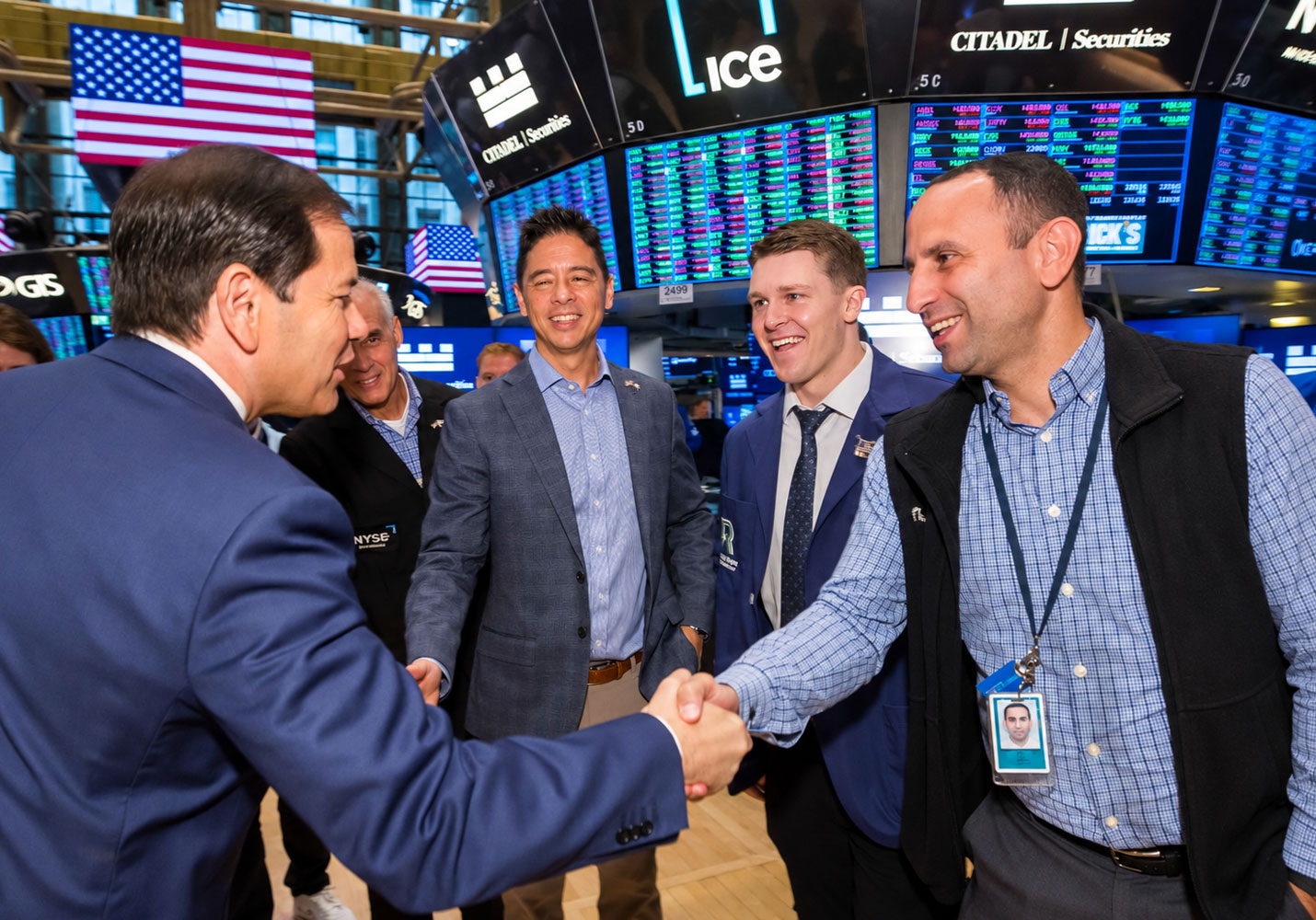 Secretary of State Marco Rubio greets Roberts and Ryan employees on NYSE floor.